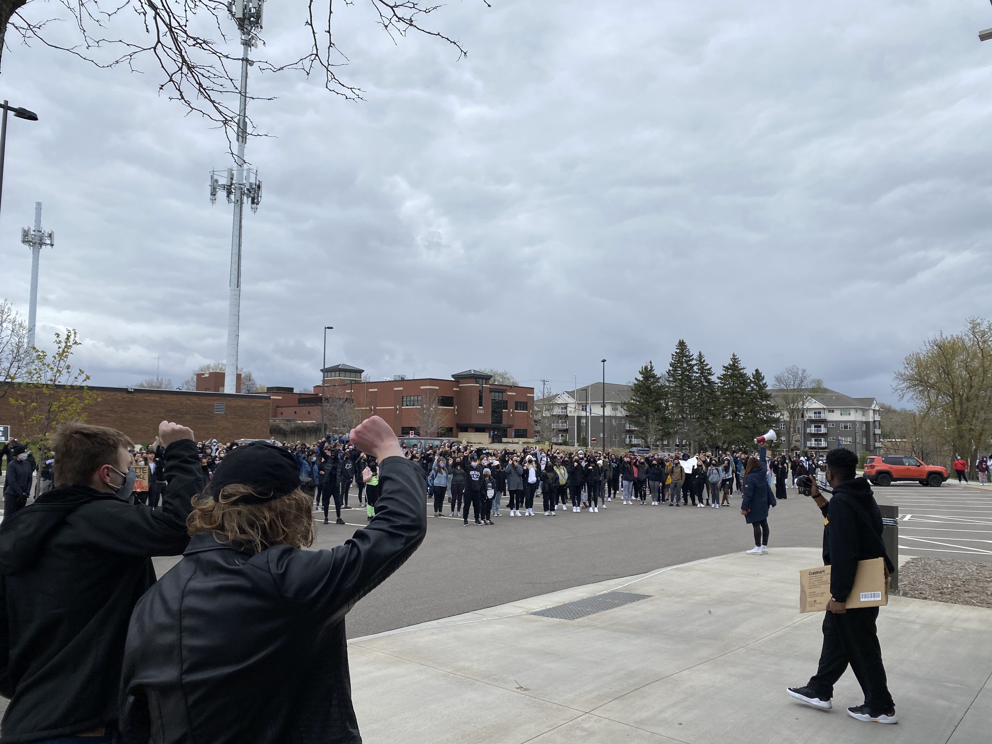 Students raising fists in solidarity